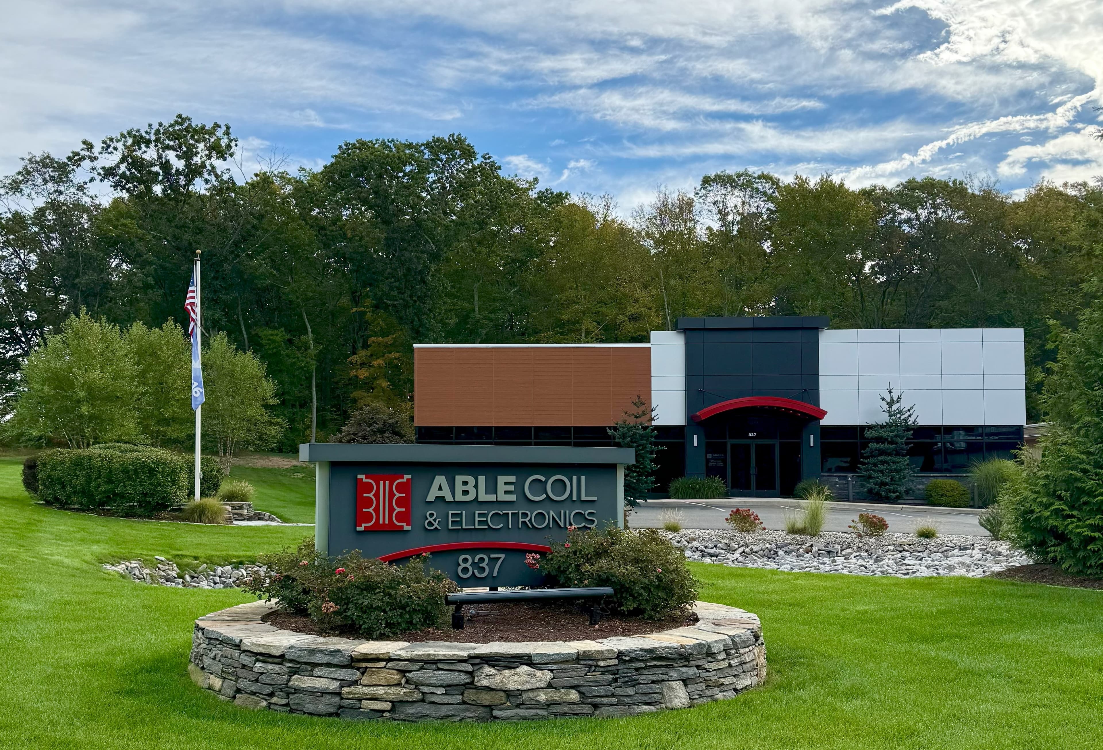 Front view of Able Coil's 2020 expansion facility with brand sign