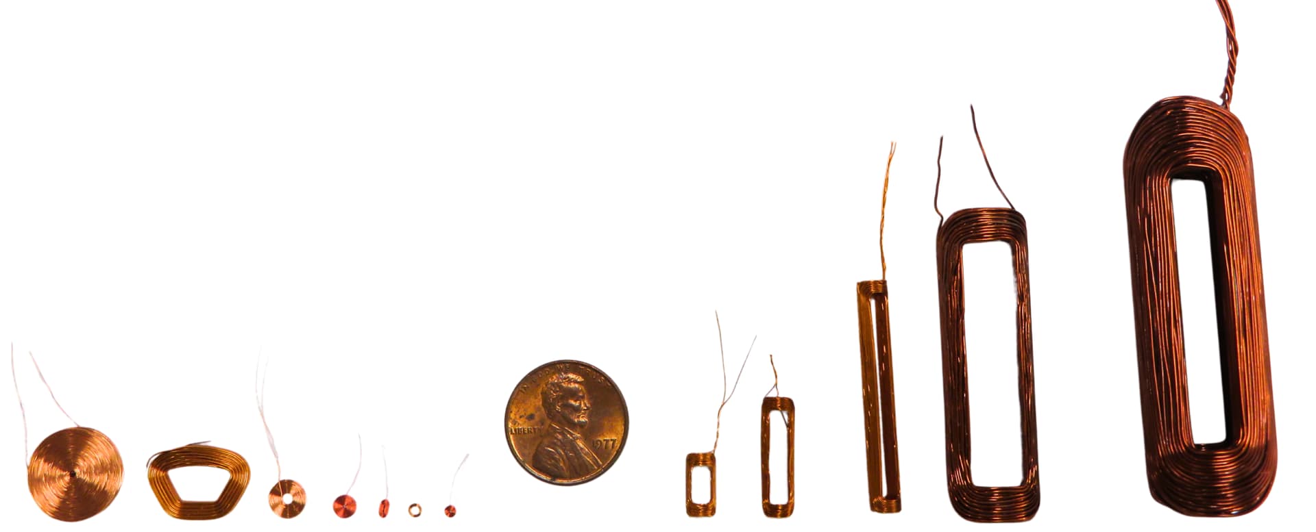 A variety of different size miniature self-supporting coils
